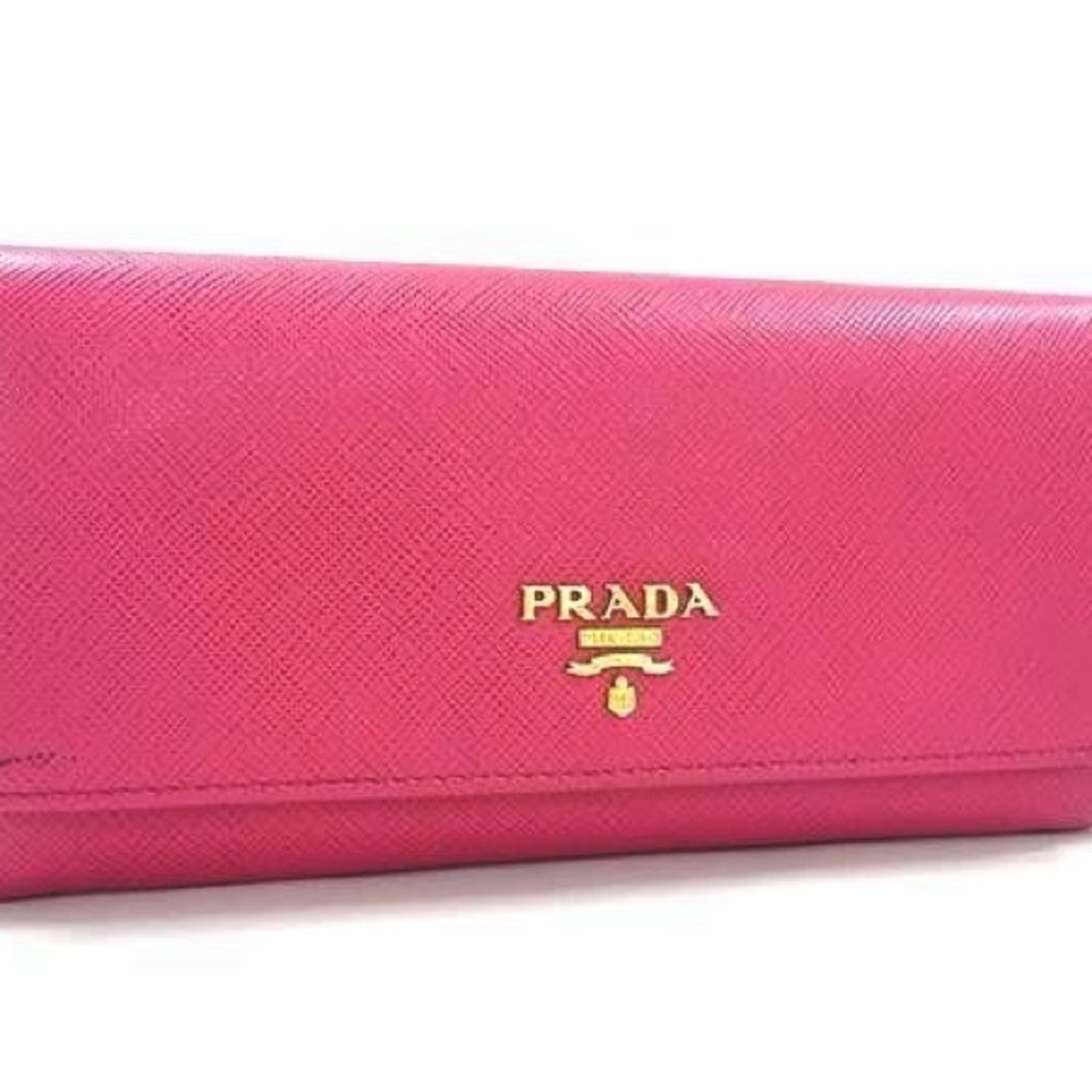 Very cute print!! Prada Saffiano leather bi-fold wallet